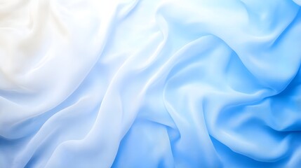Soft silky blue and white fabric with a gentle flowing wave like pattern creating an elegant and serene abstract composition