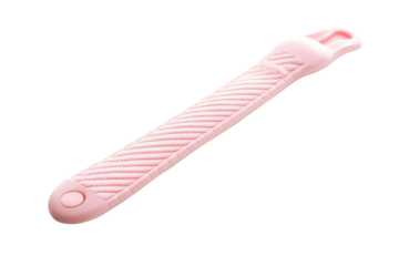 A soft pink tool designed for effortless peeling and slicing fruits in a modern kitchen setting isolated on transparent background