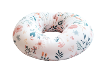 Cozy floral nursing pillow designed for comfort and support during feeding sessions isolated on transparent background