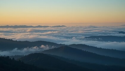 Fototapeta premium Overlooking Mountain Ridges with a Sea of Clouds at Dusk