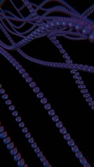 Obraz premium Strings of purple spheres form a flowing wave pattern on a black background, blending illusions and technology into a dynamic, futuristic design........