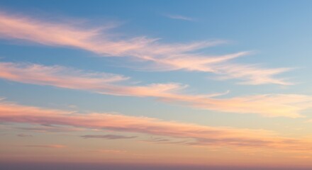 Obraz premium Sky at Dusk with Pink Clouds and Soft Light Atmosphere