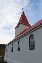 Fototapeta premium Víkurkirkja church at Vík in Southern Iceland.