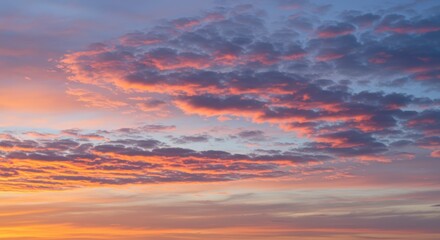 Fototapeta premium Vibrant Sky with Clouds at Sunset Offers a Dreamy Ambiance