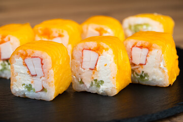 delicious traditional Japanese sushi and rolls on a plate
