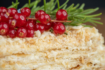 delicious fresh sweet fruit cake decorated with currants and blueberries