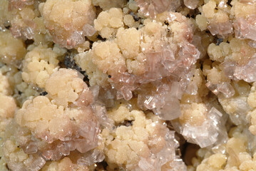 Mineral Mimetite, Straw coloured barrels of mimetite covered with clear rose tinted wulfenite crystals, Chihuahua, Mexico