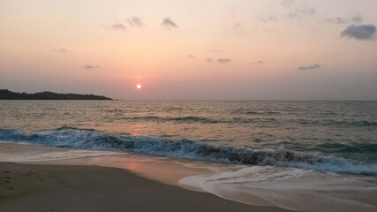 beautiful dramatic landscape of sunset on the sea beach