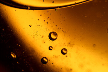 The surface of the cosmetic product has bubbles. blurred background. soft focus