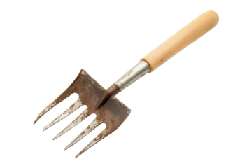 A vintage garden fork resting on a white surface, ready for planting and soil preparation isolated on transparent background