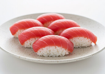 salmon tuna sushi and rolls in single or arrangement on white and black background  
