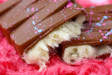 Trendy milk Angel Hair Chocolate bar with Turkish pishmaniye cotton candy filling close up