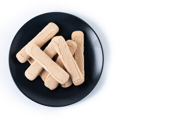 Italian biscuits ladyfingers savoiardi isolated on white background. Top view. Copy space