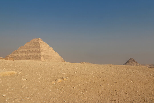 A ladder-shaped pyramid as Step Pyramid of Djoser (or Djeser and Zoser) at Saqqara, Egypt