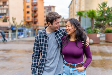 Fototapeta premium Smiling couple enjoying a day outdoors together