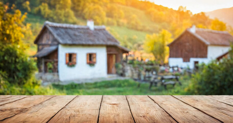 View of a rustic mountain cabin at sunset.