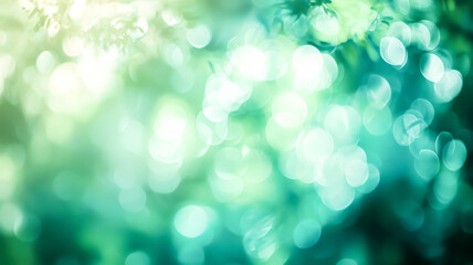 Obraz premium Abstract nature scene with blurred bokeh lights in shades of green and white, creating a dreamy and ethereal atmosphere.