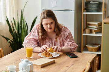 Confidence and comfort shine through a young woman enjoying breakfast at home