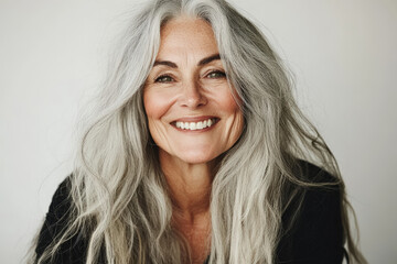 Fototapeta premium Smiling Senior Woman with Long Silver Hair 