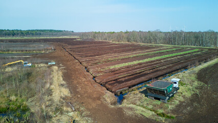 Lower Saxony, Germany - March 23, 2025: Drone footage of a peat mining area in Lower Saxony
