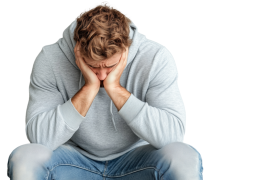 Verzweifelter junger Mann sitzt mit gesenktem Kopf PNG mit transparentem Hintergrund

