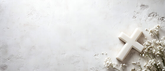 simple, minimalistic holy communion catholic ritual concept with white cross and purity symbolic white flowers isolated over bright, modern texture with copy space