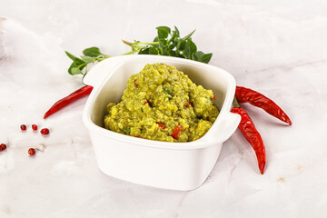 Guacamole with avocado, tomato and chili