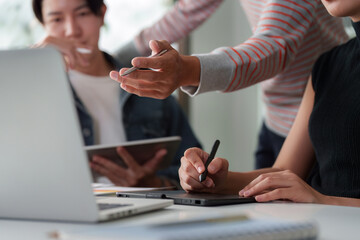 Innovative Design Process and Team Dynamics. Team members collaborating on a design project,...