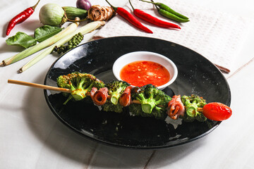 Thai Street foof satay with bacon and broccoli