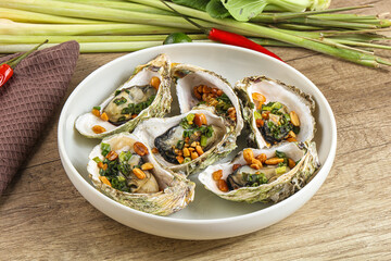 Baked oysters with green onion