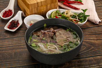Vietnamese Pho Bo soup with beef and noodles