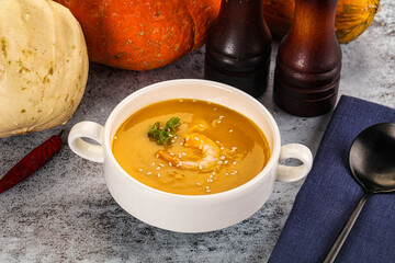 Pumpkin cream soup with prawns