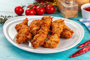 Golden crispy fried chicken strips