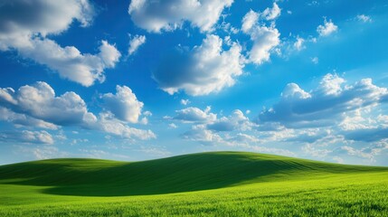 Green Rolling Hills Under Bright Blue Sky with White Clouds