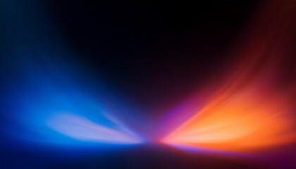 Defocused blue orange red ultraviolet radiance soft texture on dark black abstract empty space background. Neon blur glow. Color light overlay. Copy space.