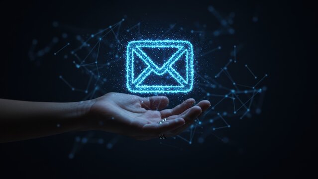 A hand holds a glowing email icon amidst a network of data connections. - Powered by Adobe