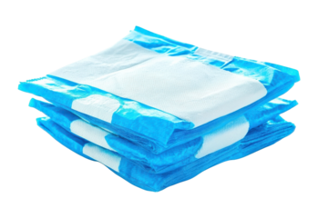Stack of blue and white disposable medical pads arranged neatly on a reflective surface isolated on transparent background