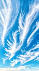 Obraz premium Serene Sky Wispy White Clouds on Vivid Blue.
