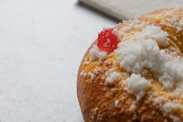 Delicious roscón de reyes with candied fruit and sugar sprinkles celebrating epiphany tradition