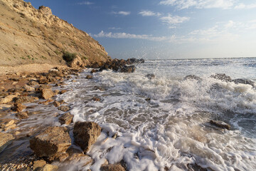 Waves are bumping against rocks