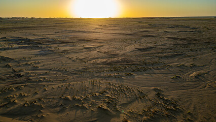 Aerial of sunset over a beautiful sand dune in the Tibesti Mountains