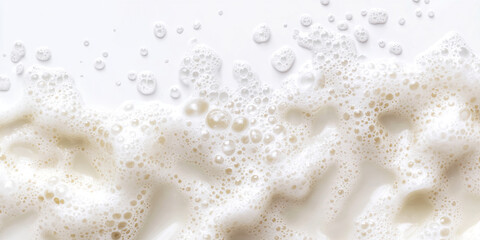 Creamy white foam texture with air bubbles, creating a soft and airy appearance, suggesting cleanliness, purity, or freshness