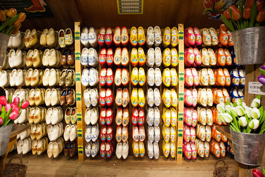Brightly coloured red and yellow wooden clogs, traditional Dutch shoes, North Holland, The Netherlands