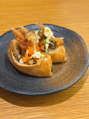 asian japanese sushi mentai cheese soft shel crab bean curd tofu skin rice wrap in plate on wood table asian dim sum halal food restaurant cuisine banquet menu for cafe
