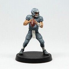 Miniature American Football Player in Action, white background