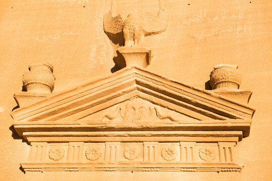 Tomb pediment carved into sandstone rock of Jabal Banat (Qasr Al-Bint) in Hegra (Madain Salih), UNESCO, AlUla, Medina Province