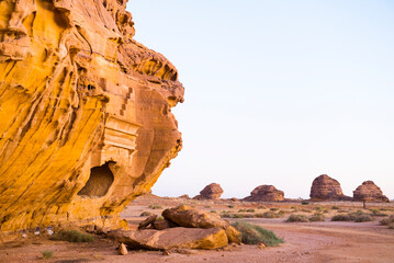 Tombs carved into the sandstone rock of Jabal Banat (Qasr al-Bint) area within site of Hegra, UNESCO, AlUla, Medina Province