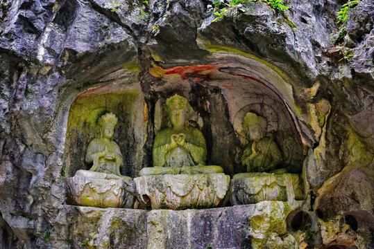 Ancient stone carvings of arhats, Bodhisattvas and Buddhas on hillside of Feilaifeng (Flying Peak), Lingyin Temple, Hangzhou, Zhejiang Province