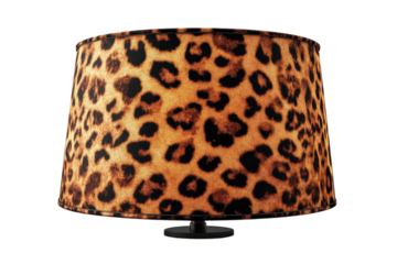 A luxurious leopard print lampshade, radiating warmth and wild elegance, its rich velvet texture adding a touch of sophisticated glamour to any room.