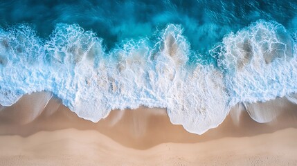 Fototapeta premium Aerial View of Ocean Waves Crashing on Sandy Beach with Turquoise Water